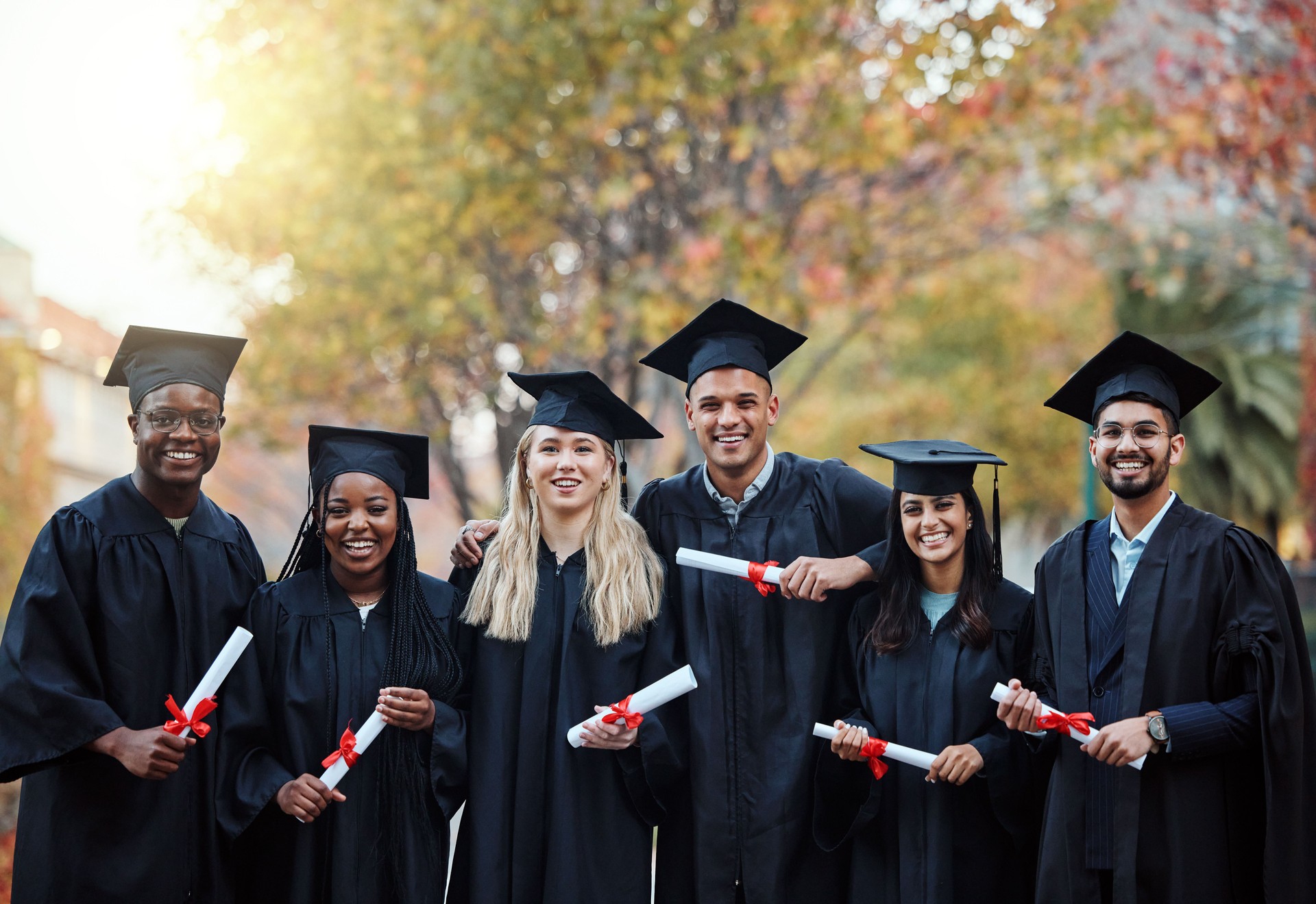 Success, graduation and portrait of friends with a diploma for education, future and college achievement in Australia. Happy, motivation and group of students with certificate from university